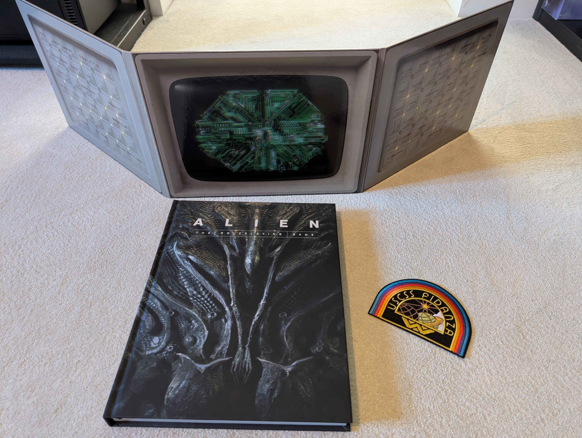 The core rolebook, a GM screen, and a patch.