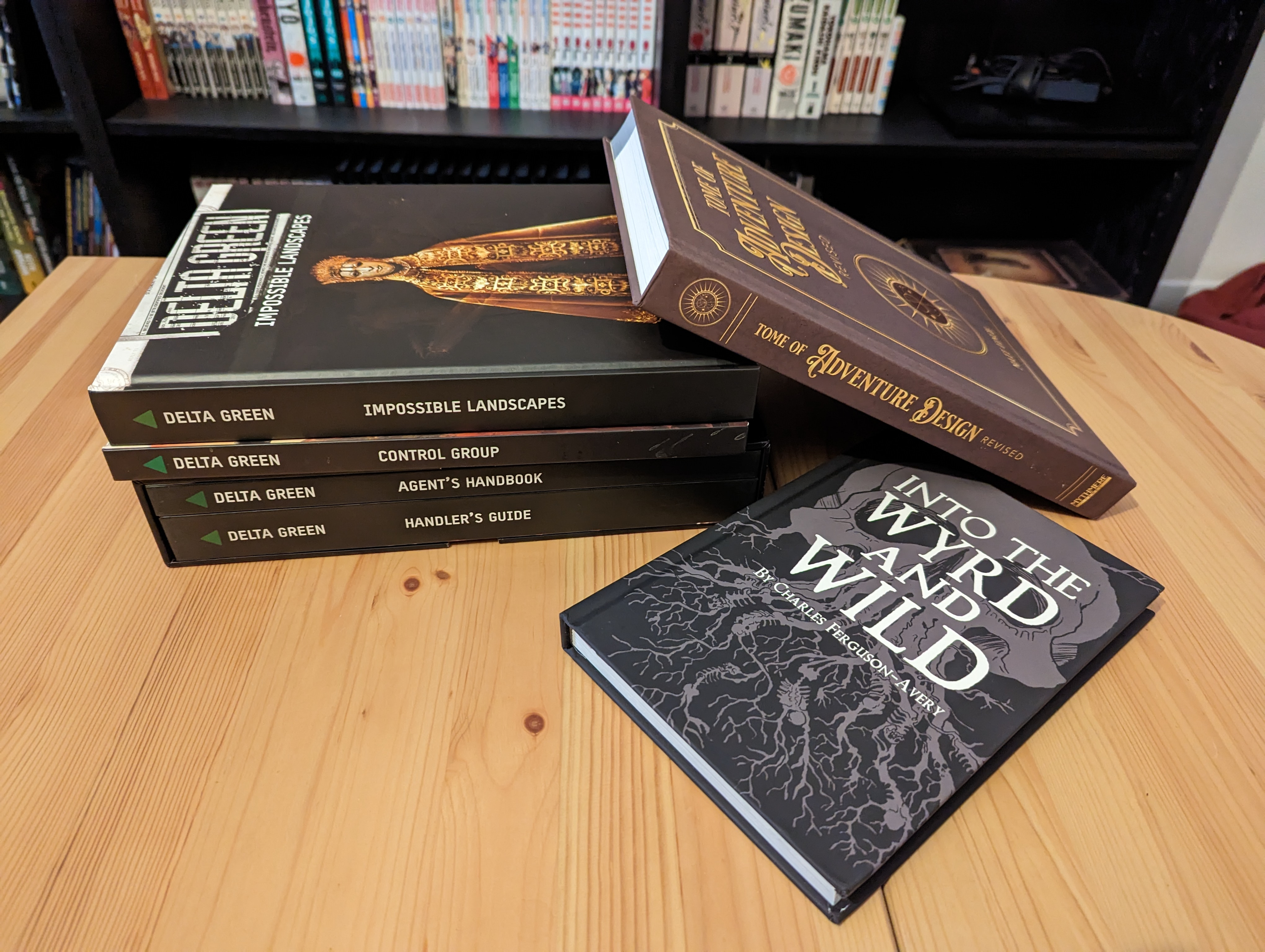 Delta Green, The Tome of Adventure Design, and Into the Wyrd and Wild