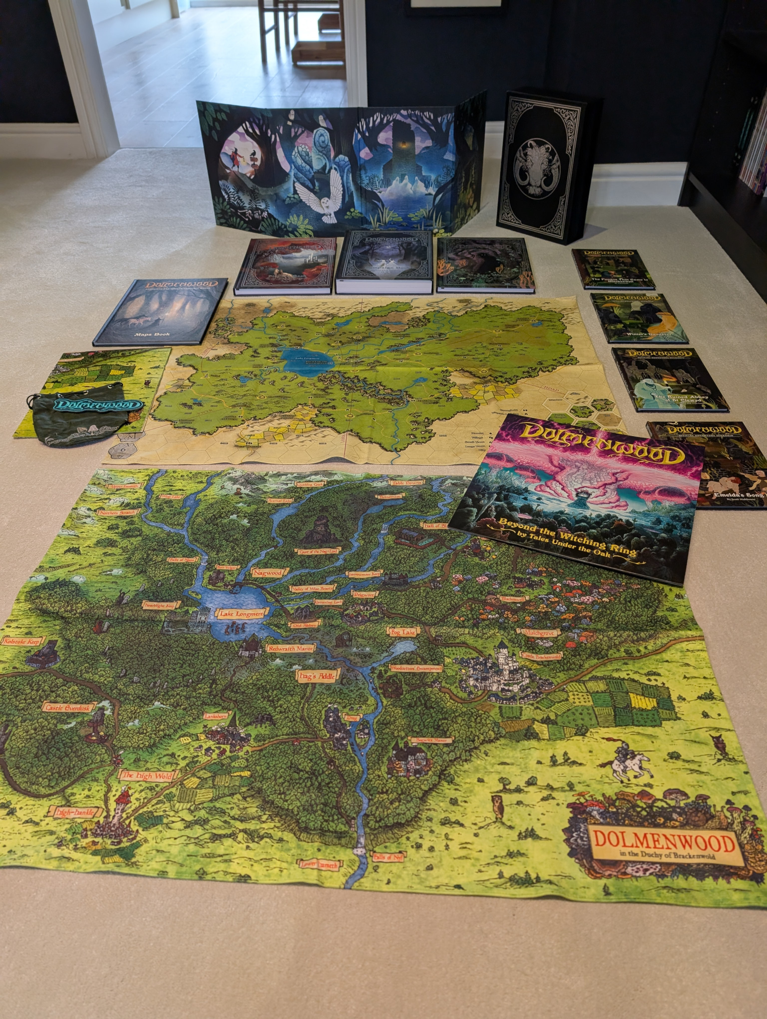 Dolmenwood: GM screen, special edition books, cloth maps, all the adventures, dice bag, and soundtrack.